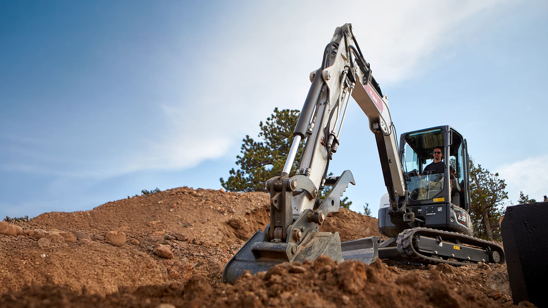 Bobcat E35 mini excavator on a job site — Delecca's 1.99% finance offer on the full range