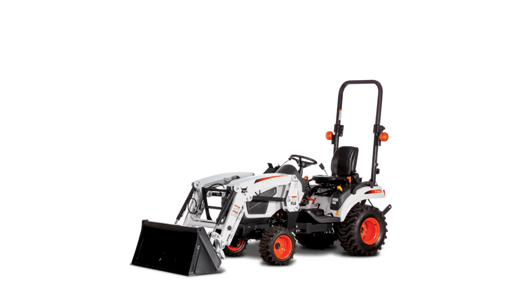 This image shows a Bobcat CT1025 compact tractor, a type of small acreage equipment designed for light-duty tasks on small properties. It features a front-end loader, versatile enough for tasks like moving soil, gravel, or feed. Its compact size and manoeuvrability make it ideal for property maintenance, gardening, and light agricultural work. The open operator station provides easy access and visibility, perfect for small acreage owners looking for efficiency in managing their land.