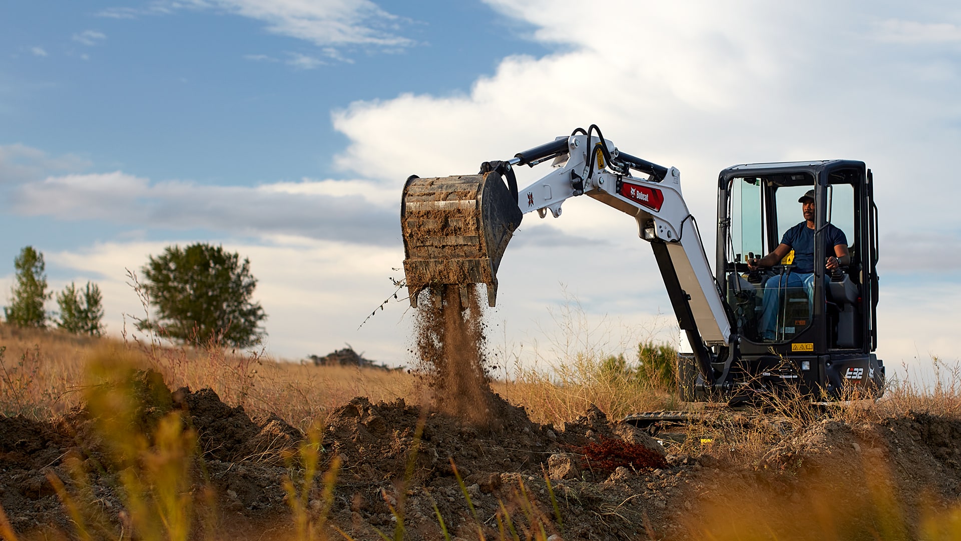 Bobcat E32 mini excavator — 3.3-tonne conventional tail swing excavator with increased dig depth and reach