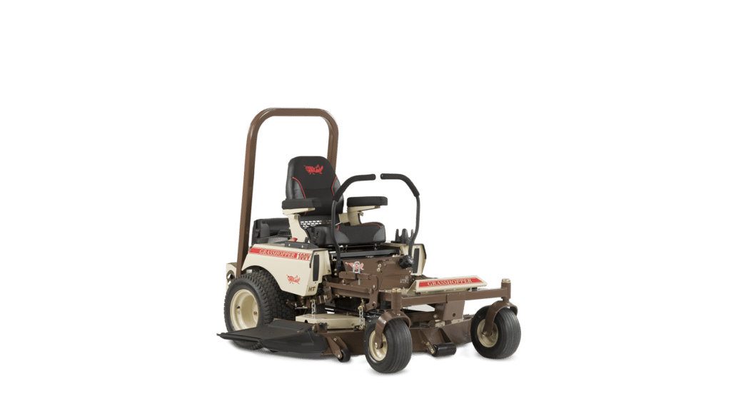 A Grasshopper 127V zero-turn mower in a studio setting, showcasing a robust frame, dual steering handles, high-backed black and red seat, and rollover protection bar. The mower features a side discharge chute and durable tires for versatile terrain handling.