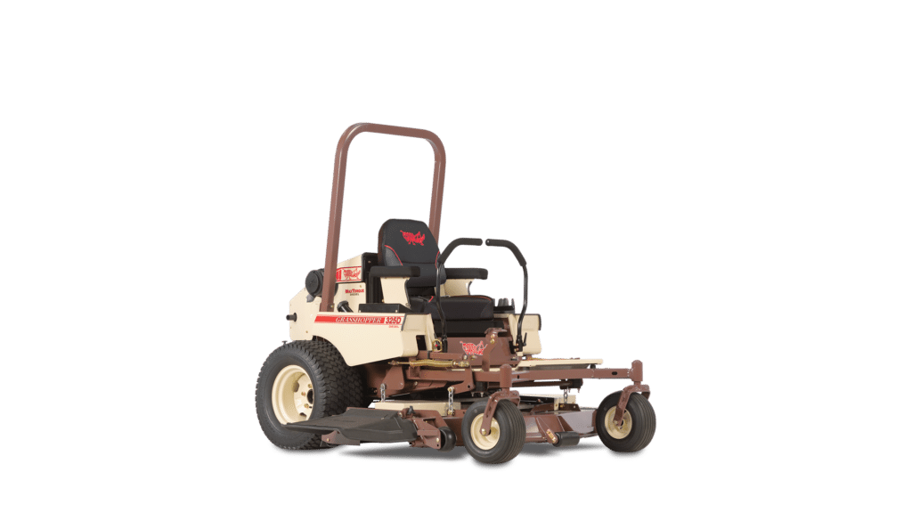A Grasshopper 325D zero turn mower in a studio setting, featuring a high-backed black and red seat, dual steering handles, and a rugged rollover protection bar. Equipped with a side discharge chute and wide tyres, this model is designed for efficient handling on various terrains.