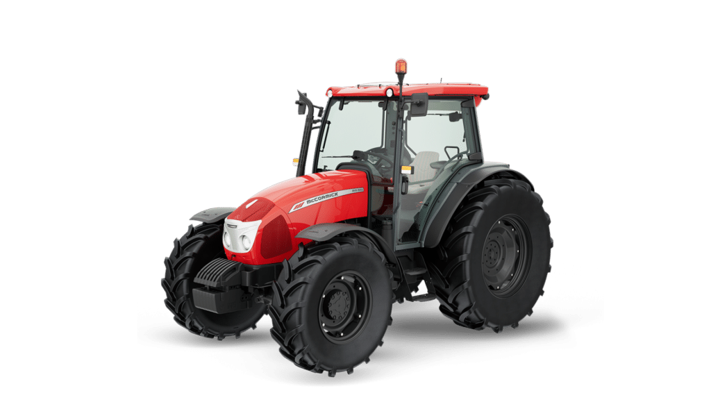 A McCormick B-MAX Farm Tractor is displayed in a studio setting, showcasing its robust design and modern features. The bright red body and large, durable tyres highlight its power and reliability, making it ideal for a range of farming tasks.