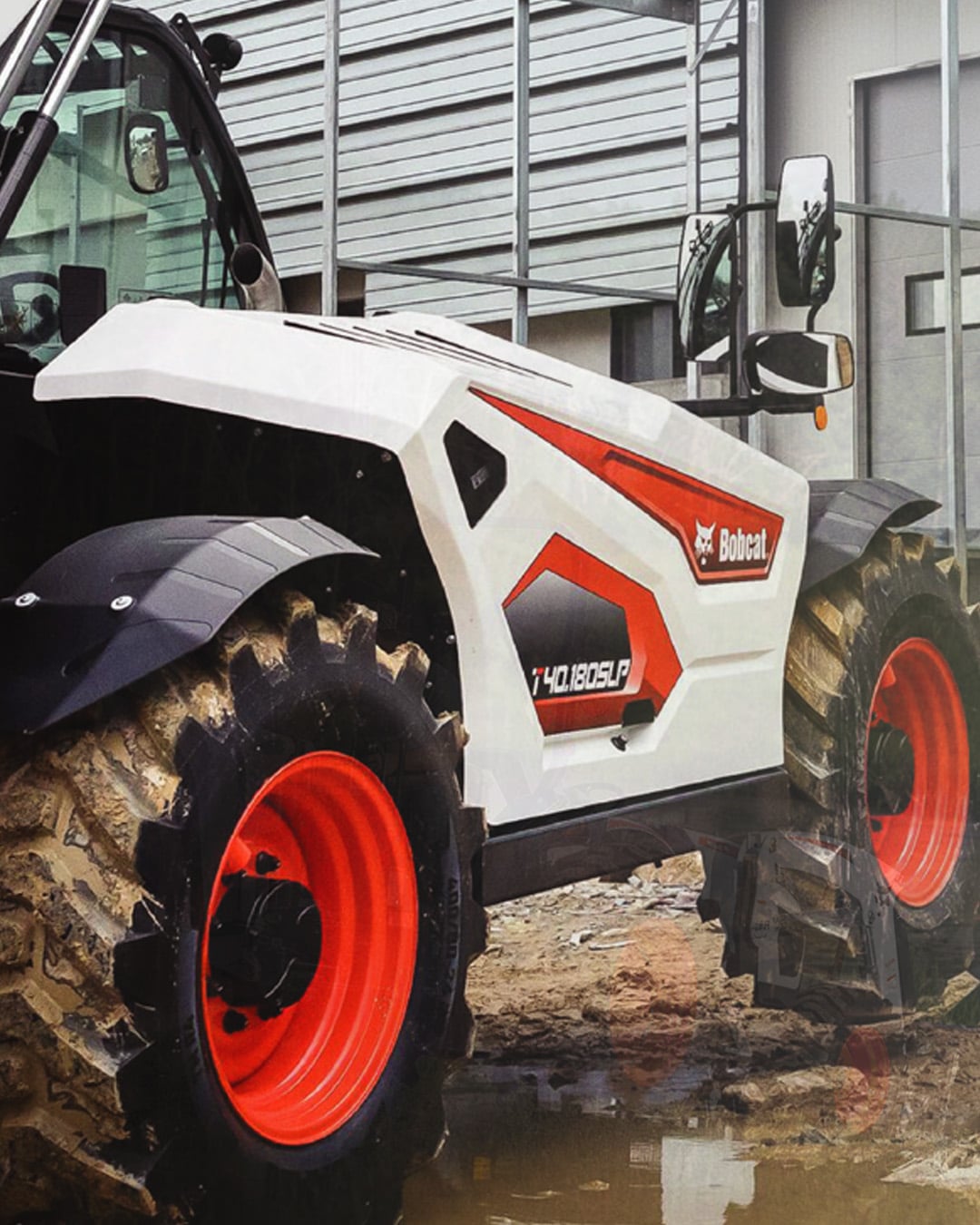 A Bobcat T40.180 Construction Telehandler positioned on a muddy construction site, highlighting its rugged all-terrain wheels, durable build, and ability to operate in challenging site conditions.