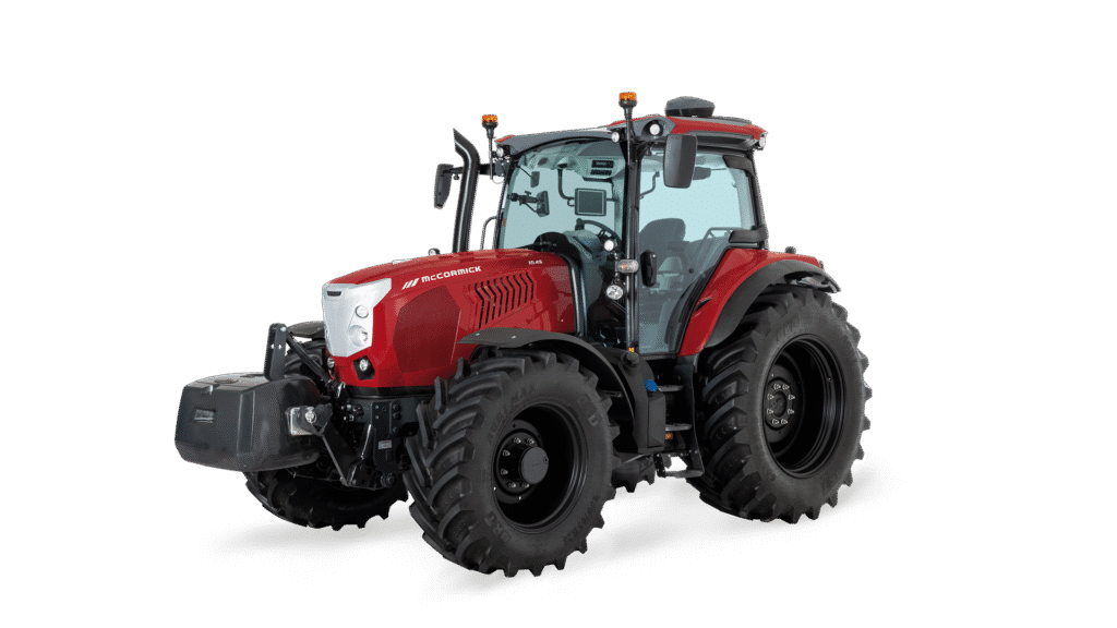 McCormick X6 farm tractor studio image with front weight and cab detail on white background.