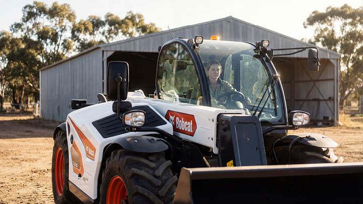 Female farm operator in Bobcat TL30.60 agricultural telehandler - no high risk work licence required